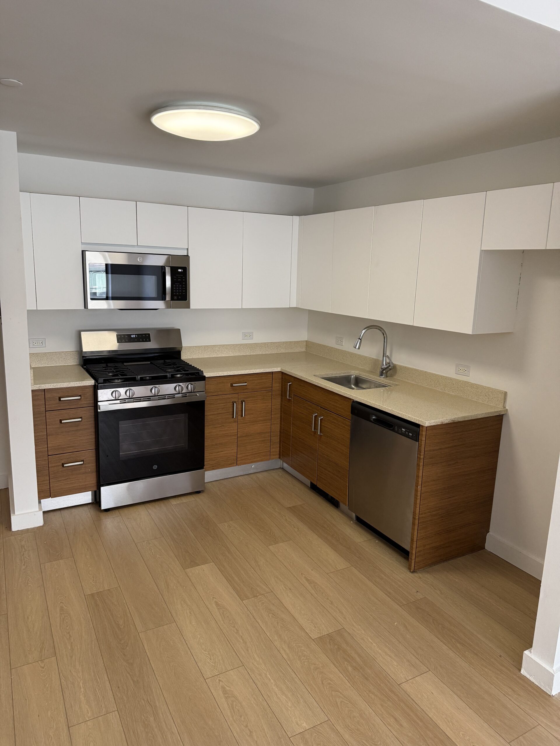 After kitchen surface refresh showing a premium updated finish