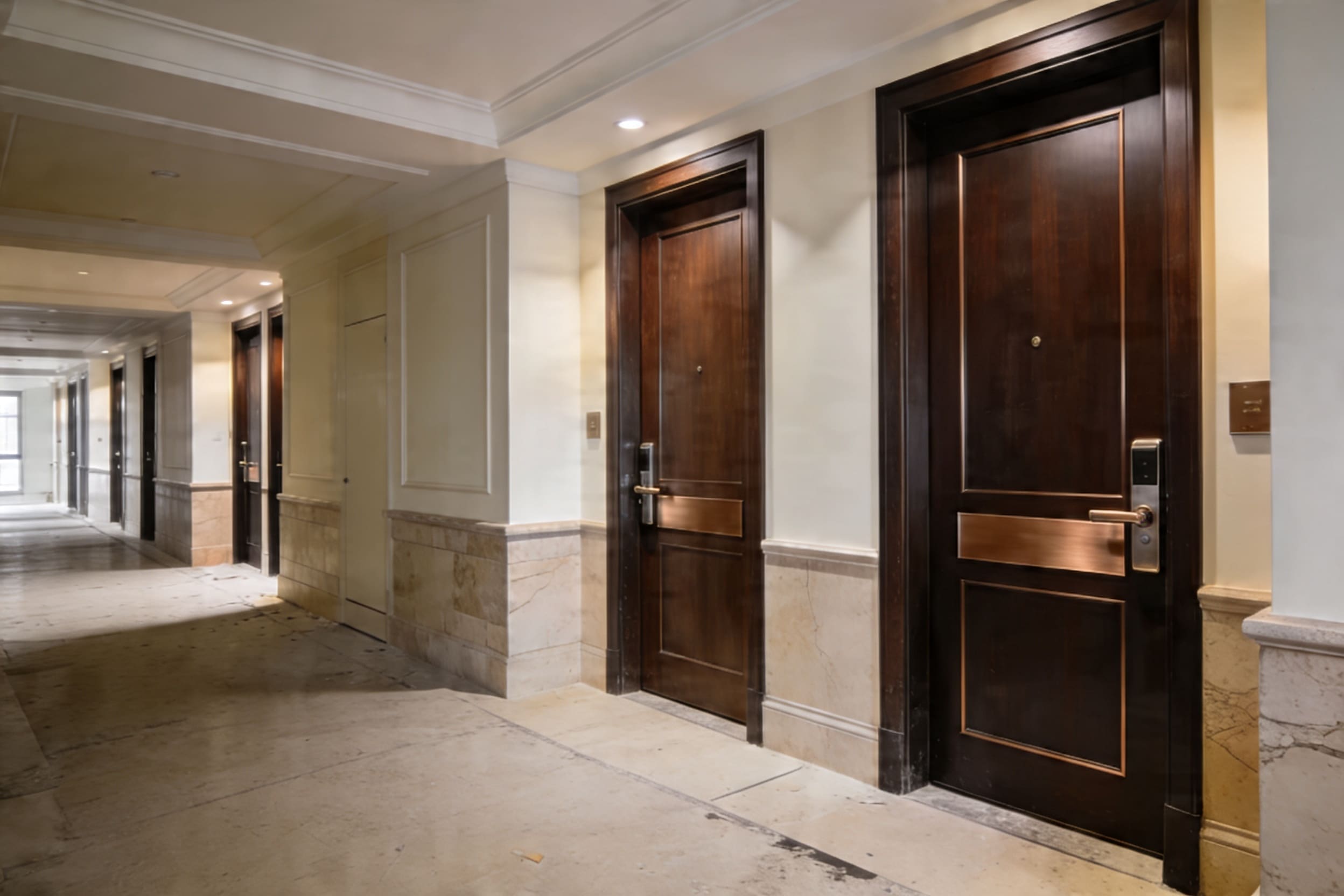 Commercial door restoration in a premium corridor
