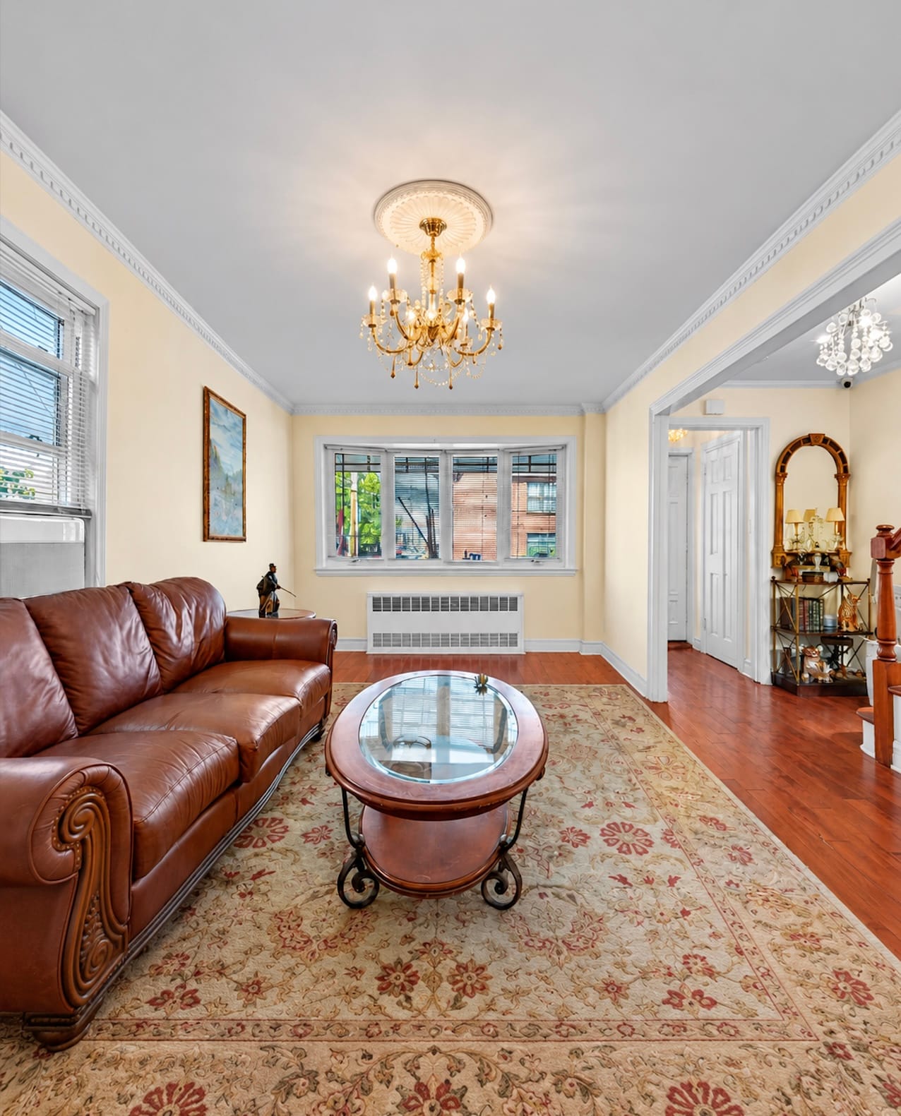 Outdated NYC apartment living space before full interior renovation